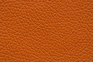 Bright orange artificial leather with large texture, macro. clipart