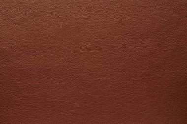 Yapay zengin kahverengi deri yüzey dokusu.