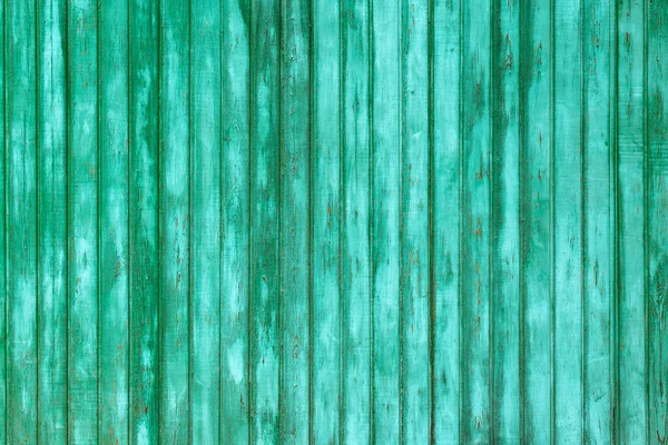 Textura de uma parede de madeira pintada verde . — Fotografia de Stock