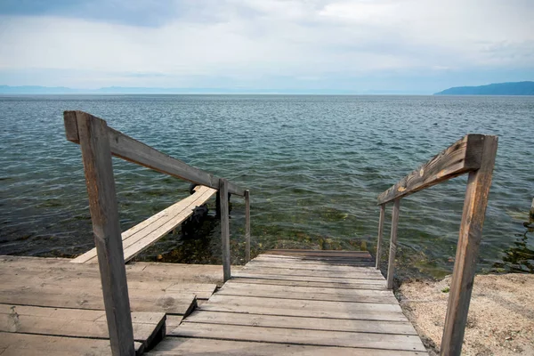 View of lake Baikal from a wooden pier, Russia.