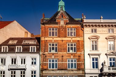 beautiful historical buildings against blue sky at sunny day, copenhagen, denmark clipart
