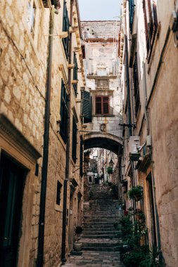 urban scene with empty narrow street in Dubrovnik city, Croatia clipart