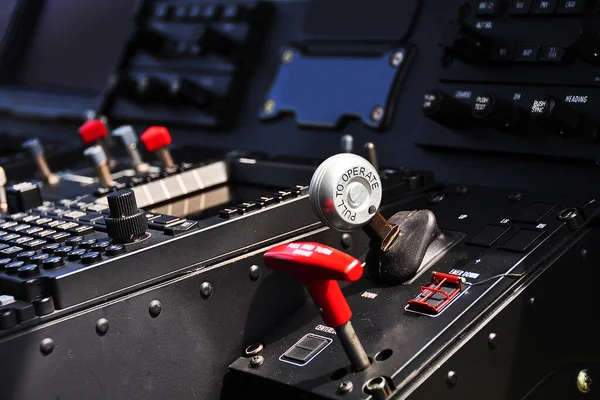 Control panel and control equipment of plane in cockpit. Plane cockpit with many function to control. monitor equipment in plane cockpit and operation by pilot and copilot in transport business.