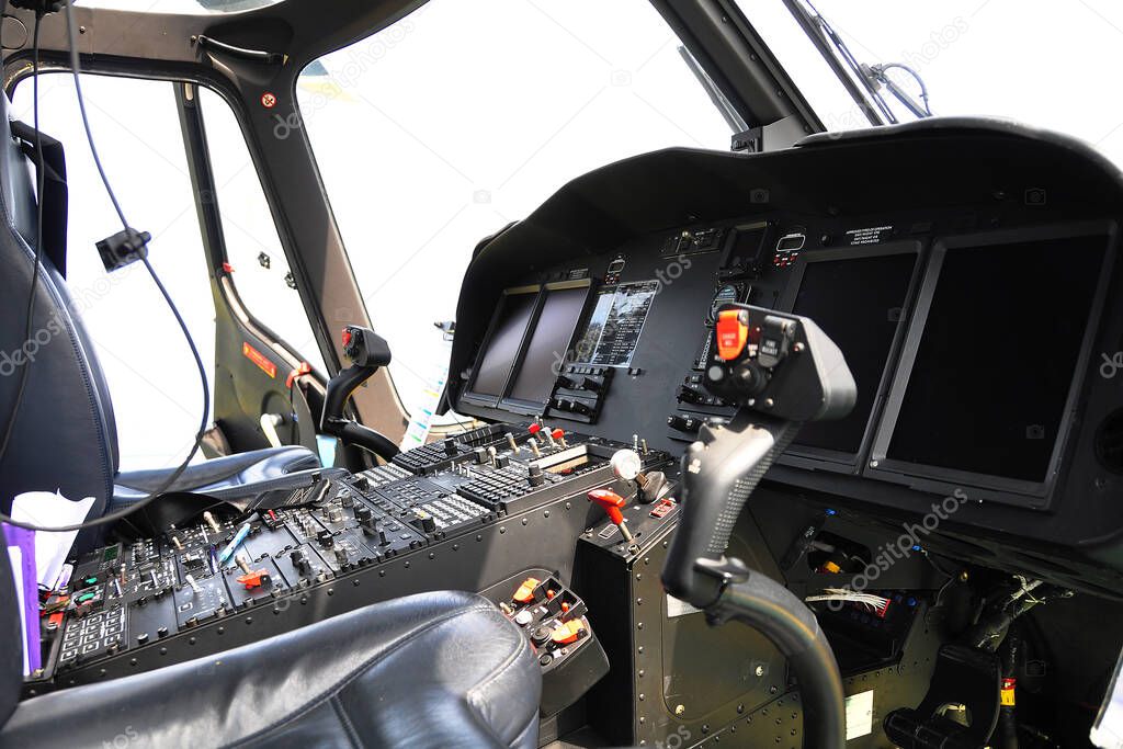 Control panel and control equipment of plane in cockpit. Plane cockpit with many function to control. monitor equipment in plane cockpit and operation by pilot and copilot in transport business.