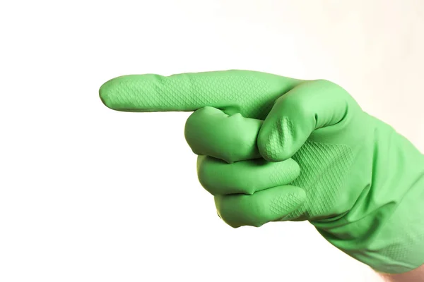 Uma Mão Luva Verde Sobre Fundo Branco Isolado Fotografia De Stock