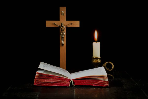 Book Background Crucifix Lit Candle Candlestick Black Background — Stock Photo, Image