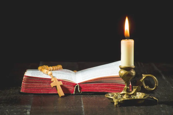Rosary Book Lit Candle Candlestick Black Background — Stock Photo, Image