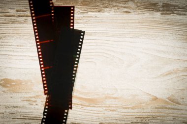 Analog Fotoğrafçılık, rustik bir arka plan üzerinde negatif kavramı