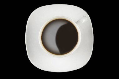 Siyah arka planda bir fincan kahve - üst görünüm