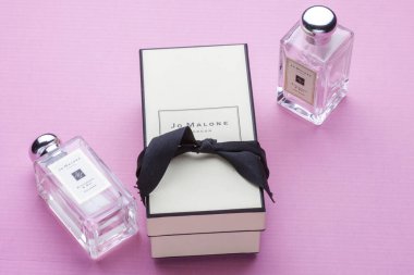 KIEV, UKRAINE - June 11, 2020: two bottles of Jo malone Blackberry & bay perfume on a pink background with packaging. Parfum clipart