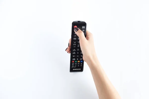 Television controller in woman hand — Stock Photo, Image