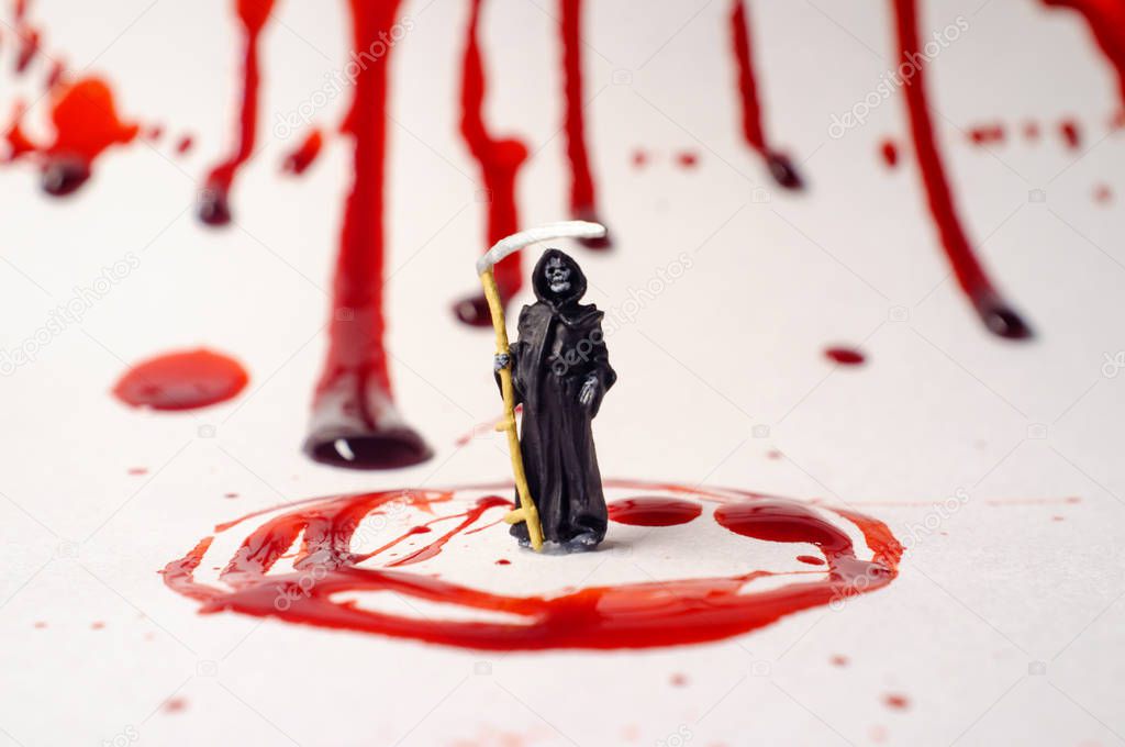 Grim reaper with blood spatter dripping to symbolize death