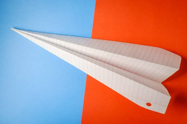 Paper Air Plane Closeup Colorful Blue Orange Background — Stock Photo, Image