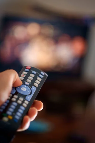 Close Remote Hand Shallow Depth Field Television Watching — Stock Photo, Image