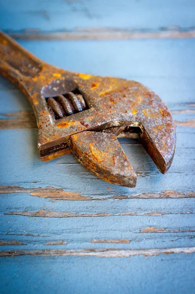 Old Rusty Adjustable Wrench Contractors Tool Worn Wooden Floor — Stock Photo, Image