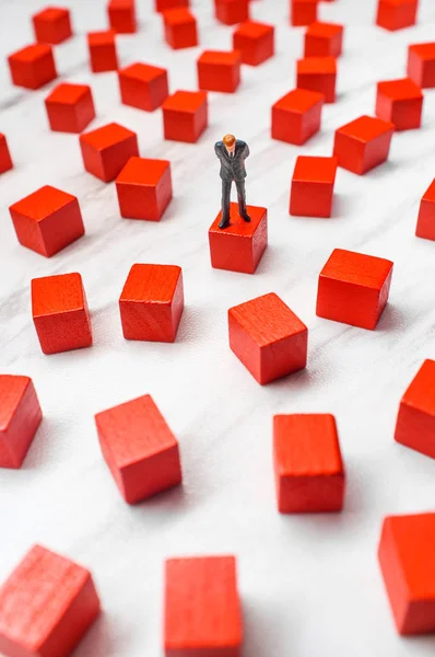 Miniature Businessmen Surrounded Wooden Blocks Representing Possible Choices Solutions Problem — Stock Photo, Image