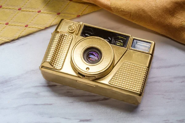 Luxury gold point and shoot vintage 35mm film camera