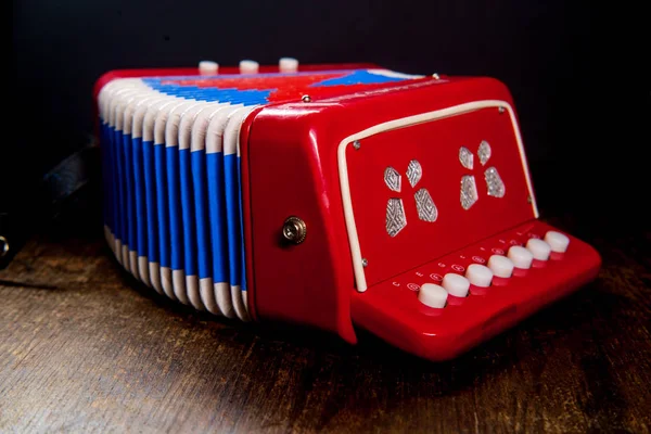 Zabawka instrument muzyczny akordeon — Zdjęcie stockowe