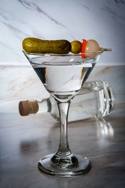 Dry Gin Martini Served Neat Pickle Cocktail Stirrer Bottle Background — Stock Photo, Image