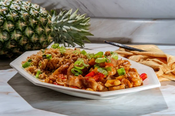 Asian cashew pineapple chicken with plain fried rice