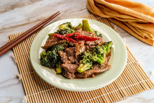 Szechuan stir fried beef with broccoli and hot peppers