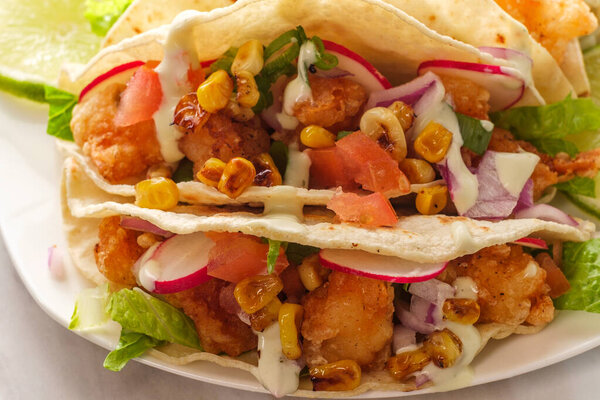 Crispy fried boom boom shrimp tacos with rice