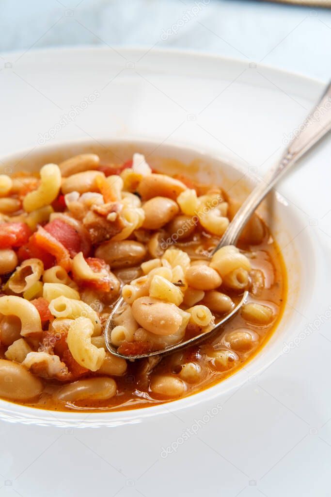 Traditional Italian peasant bean soup pasta e fagioli with gluten-free elbow macaroni noodles