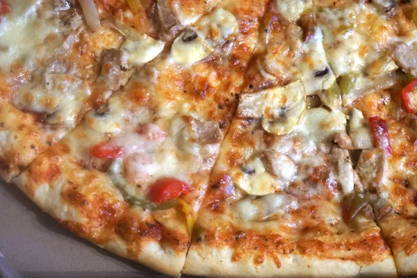 meat pizza with pepper and cheese