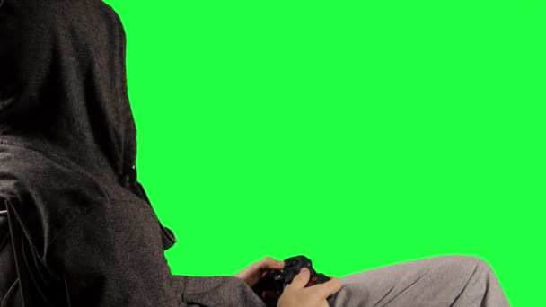 Player presses the button gamepad by playing a video game, chromakey — Stock Video