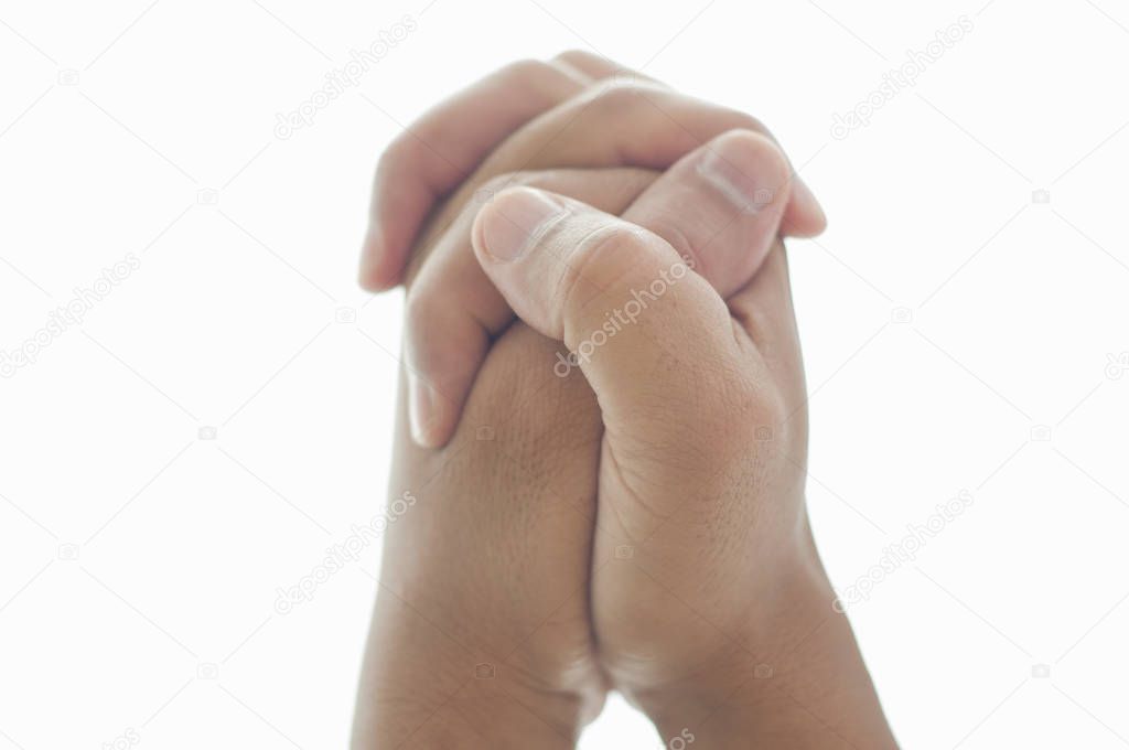 Hands clasped together on white background