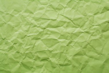 Yeşil kağıt, buruşuk kağıt, kağıt kırıntıları, arkaplan ve kopyalama alanı.