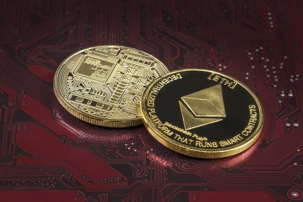 Ethereum coin on computer electronic circuit board of video card. Cryptocurrency background