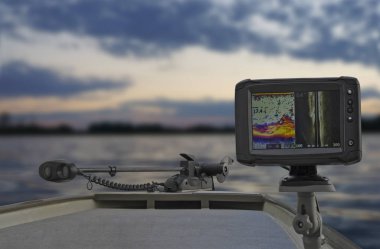 Fishing boat with fish finder, echolot, sonar and structure scaner aboard clipart