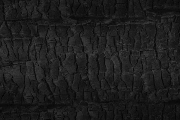 Чорний гранжевий фон. Згоріла текстура деревини . — стокове фото