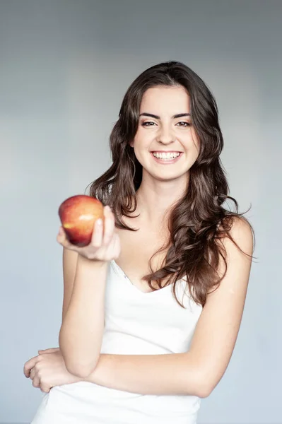 Smiling Woman Healthy Teeth Holding Red Apple Studio Isolated Portrait — Stock Photo, Image