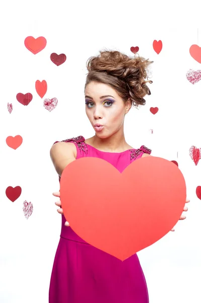 Young Cheerful Caucasian Brunette Pink Dress Holding Red Heart Isolated — Stock Photo, Image