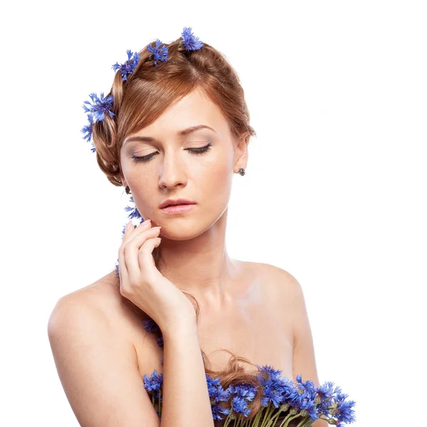 Girl with cornflowers in her hair — Stock Photo, Image