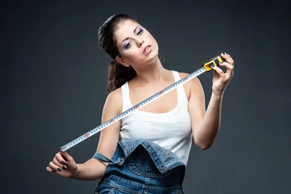 Sexy cute girl who is builder, painter, worker being in a renova — Stock Photo, Image