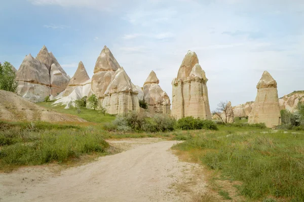 front view of famous fairy chimneys in valley, Cappadocia, Turkey 