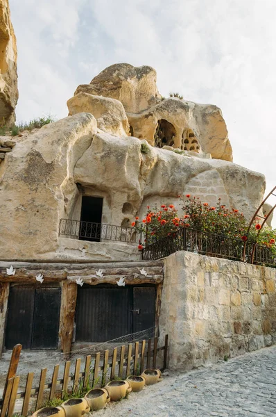 Low angle view of dwelling in stone formation in Cappadocia, Turkey — Stock Photo