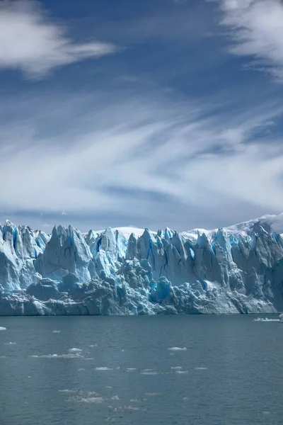 GLACIAL SHOW PERITO MORENO, PATAGONIA, ARGENTINA As I stand before the beast that Perito Moreno is, look up the 70m high wall of ice and hear it breath and crack, I get the intense feeling that the great nature of Patagonia is truly alive and wild!