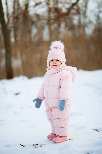 Little Beautiful Girl Pink Jumpsuit Smiles Snowy Winter Park — Stock Photo, Image