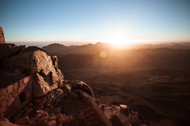 dawn on the top of mount Moses with blue sky clipart