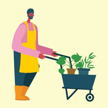 El arabası olan genç bir bahçıvan. Modern düz bir şekilde vektör illüstrasyonu