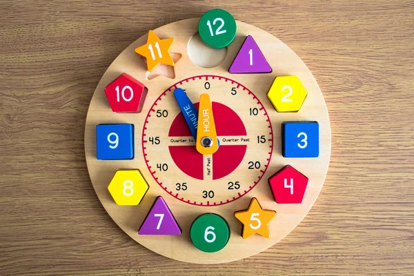 Toy Wooden Clock Wooden Background — Stock Photo, Image