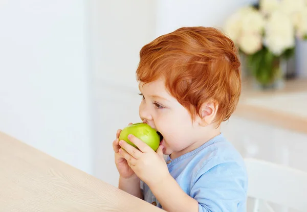 Cute Redhead Toddler Baby Biting Tasty Green Apple — Stock Photo, Image