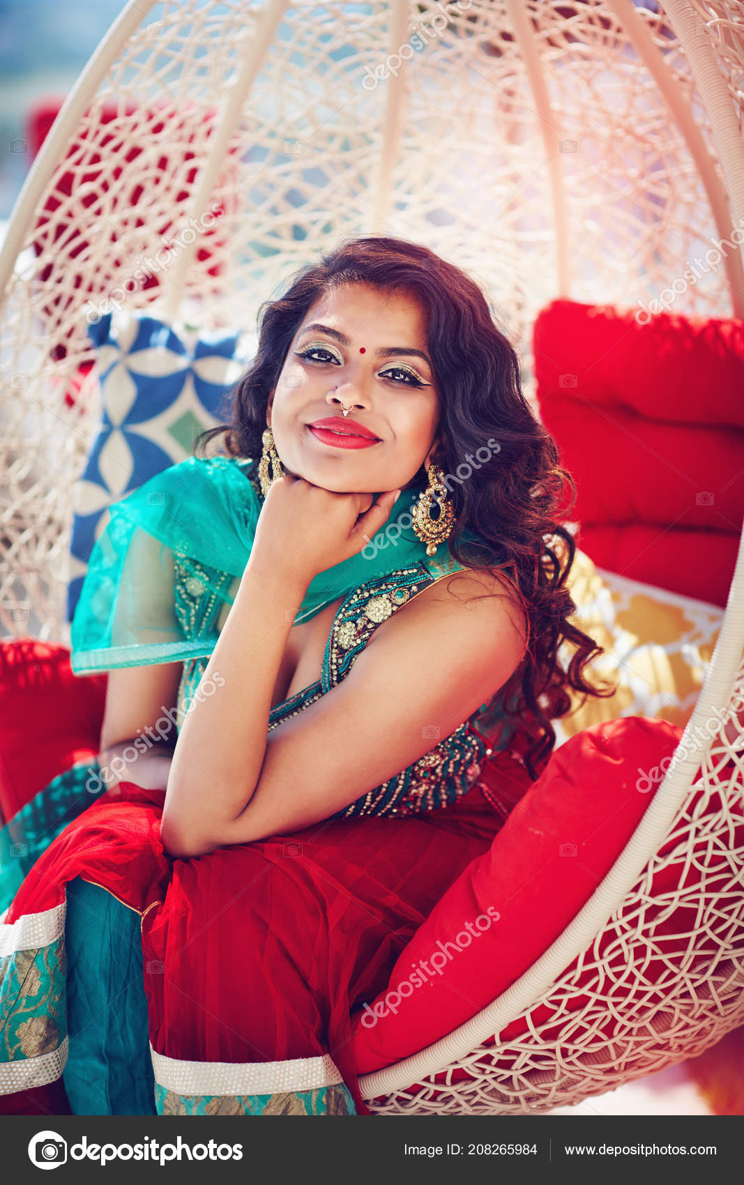 Portrait of beautiful indian girl wearing indian traditional wall mural •  murals vogue, traditional, sunshine | myloview.com