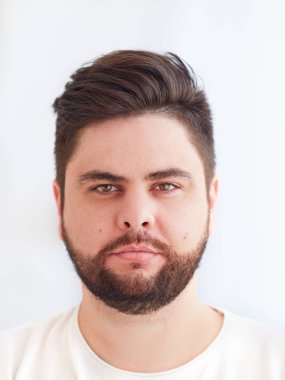 shoulder portrait of thirty years old, bearded man