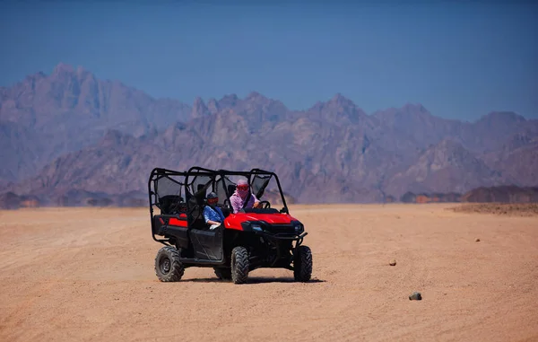 riding a buggy car through the desert. thrill tourism adventures