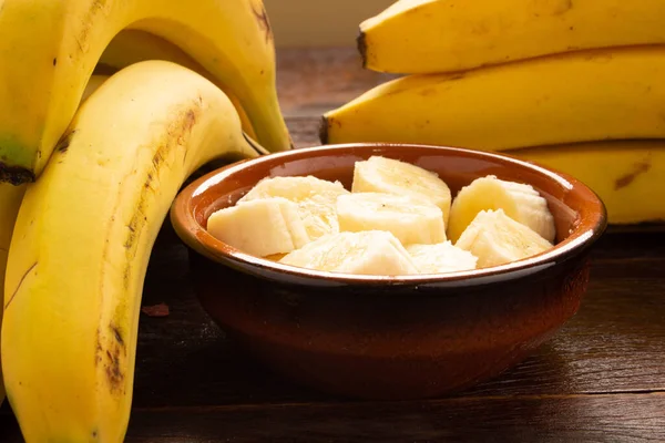 Bunch Bananas Sliced Banana Pot Wooden Table — Stock Photo, Image